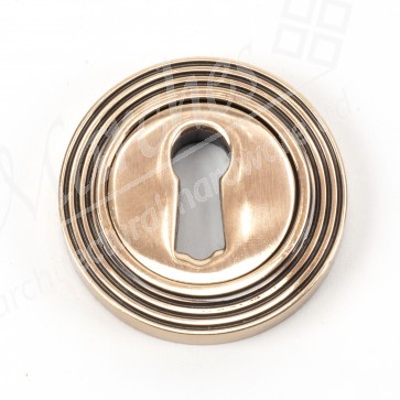 Round Escutcheon (Beehive) - Polished Bronze