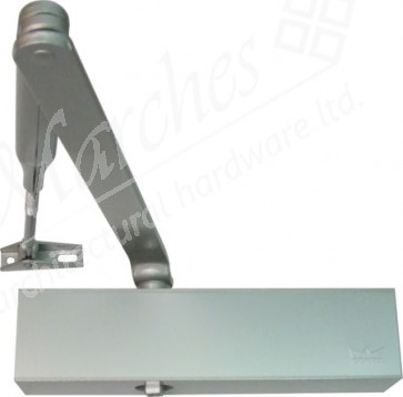 Dorma TS 83 overhead rack and pinion guide rail door closer, with flat form arm